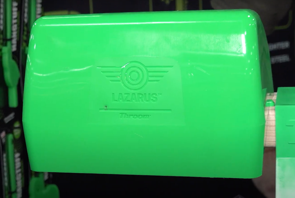 Close-up of the Throom Targets x Lazarus Targets shoot-through sleeve cover, designed to protect the servo system while ensuring no-ricochet, shoot-through safety.