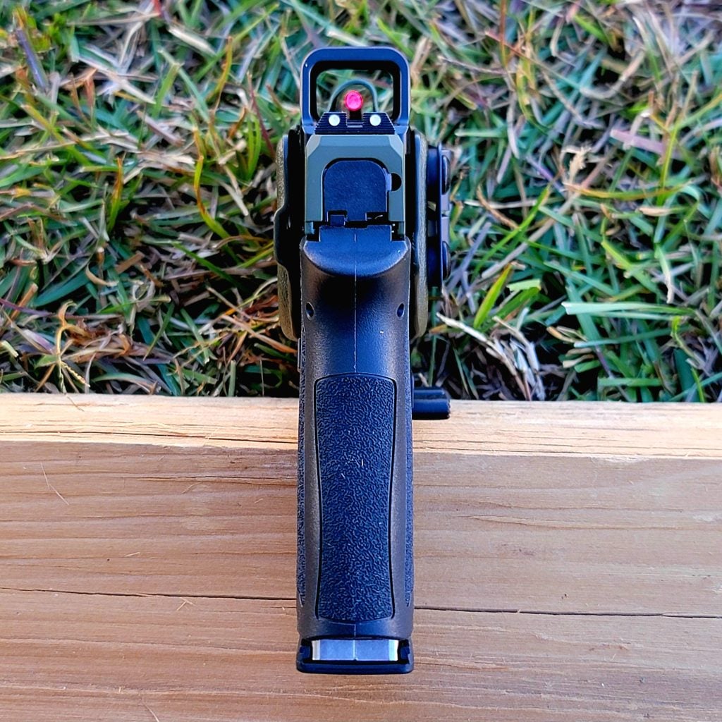 Micro Dagger X-1 rear view showing grip texture and Osight K red dot sight alignment