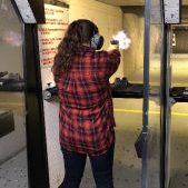 girl at the gun range