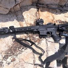 CC.com-Savage-MSR-Recon-set-up-for-home-defense-with-a-two-point-sling-and-light.-The-red-dot-sight-is-a-handy-add-on.