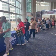 A line on the first day of attendees waiting to enter the event.