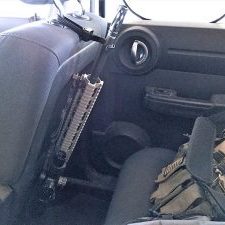 Matching the angle of the gun to the seat back stabilizes the setup.