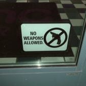 No Weapons Allowed Sign