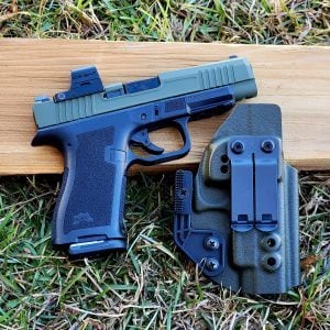 Micro Dagger X-1 9mm pistol with Osight K optic next to KSG Armory Lexington concealed carry holster