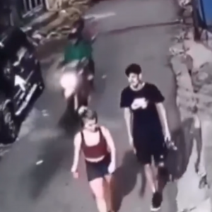 Armed robber of pedestrians photo grab