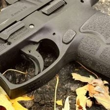 Close-up of the HK VP9 A1 button magazine release