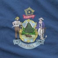 Maine US state flag depicted on folded wavy fabric of old cloth close up