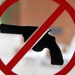 no guns allowed sign on window