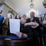 Bob Brown/Richmond Times-Dispatch via AP